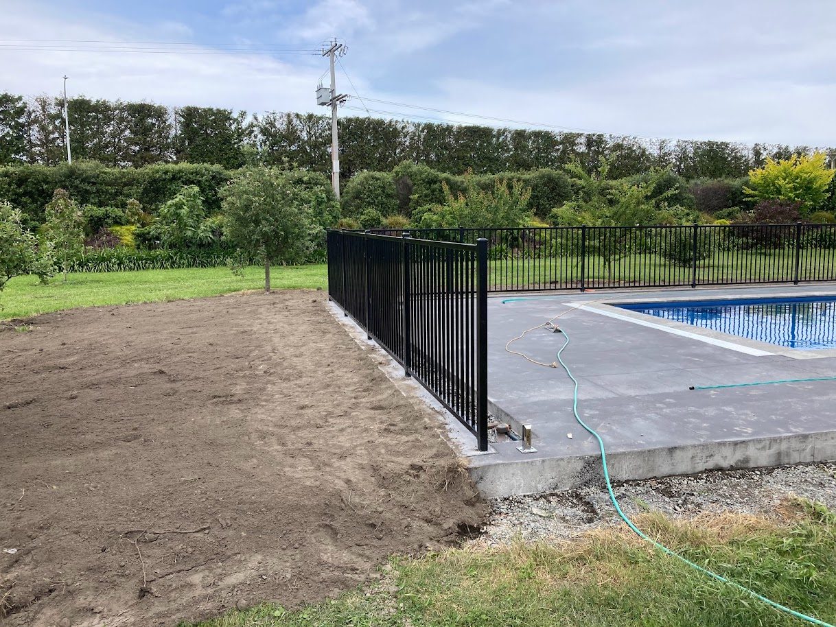 Pool fencing and mowing strip