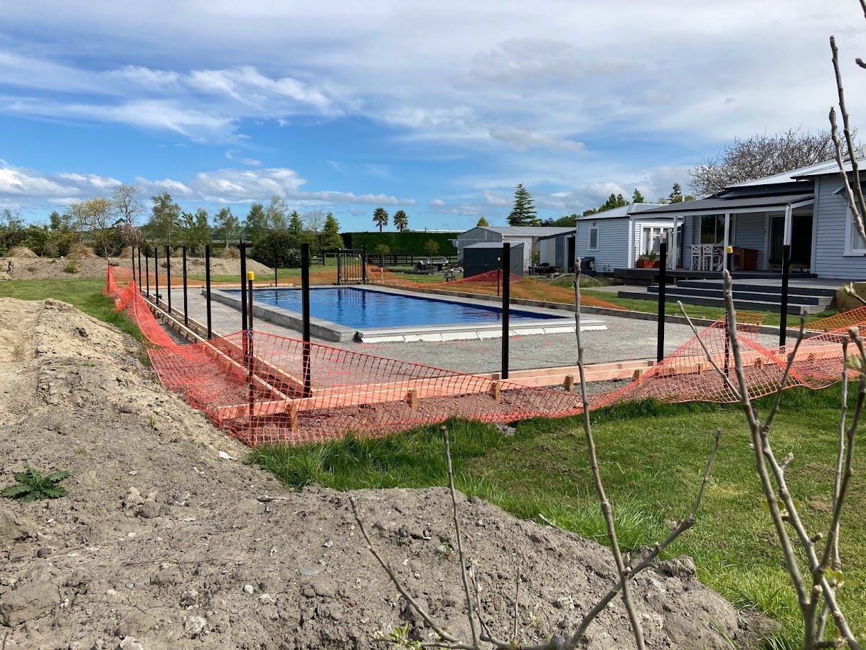 Pool Fence posts cast in concrete
